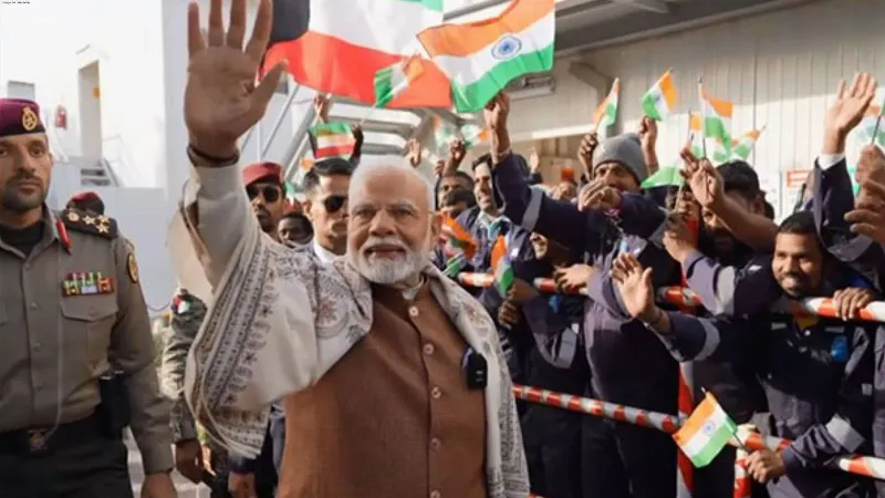 PM Modi interacts with Indian workers at Gulf Spic Labour Camp in Kuwait