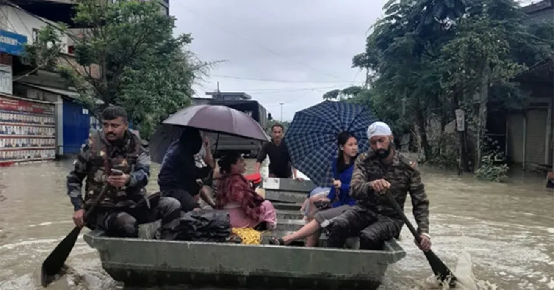 Security personnel rescue people stranded in floods in Northeastern states