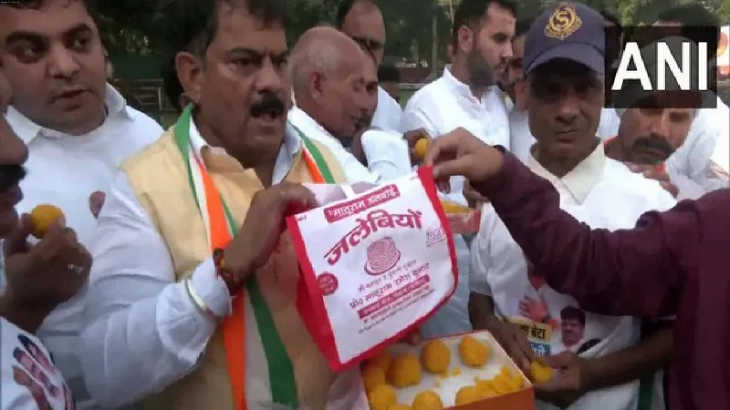 Counting Day: Congress workers celebrate with laddoos, jalebis as party leads in early trends in Haryana, JK