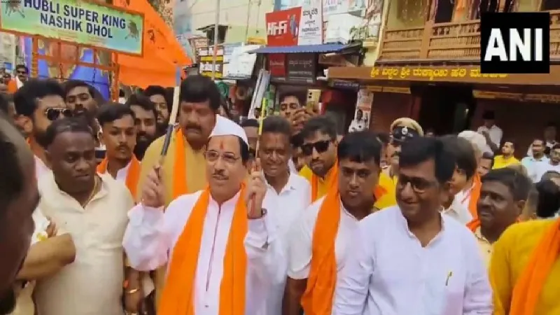 Karnataka: Union Minister Pralhad Joshi takes part in Ganesh Puja procession in Hubbali on Ganesh Chaturthi