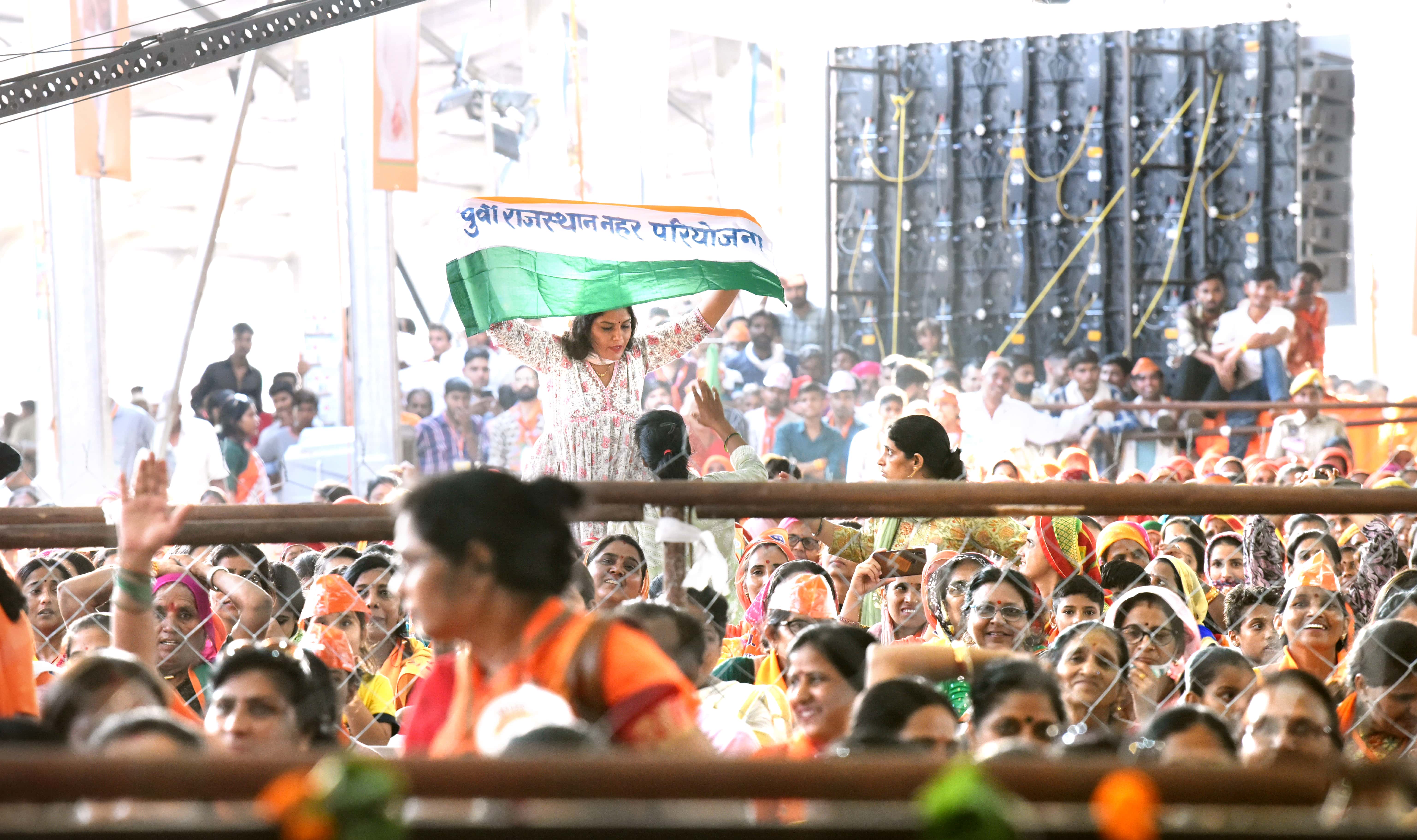 A woman was seen waiving a banner demanding ERCP at Dadiya, Jaipur