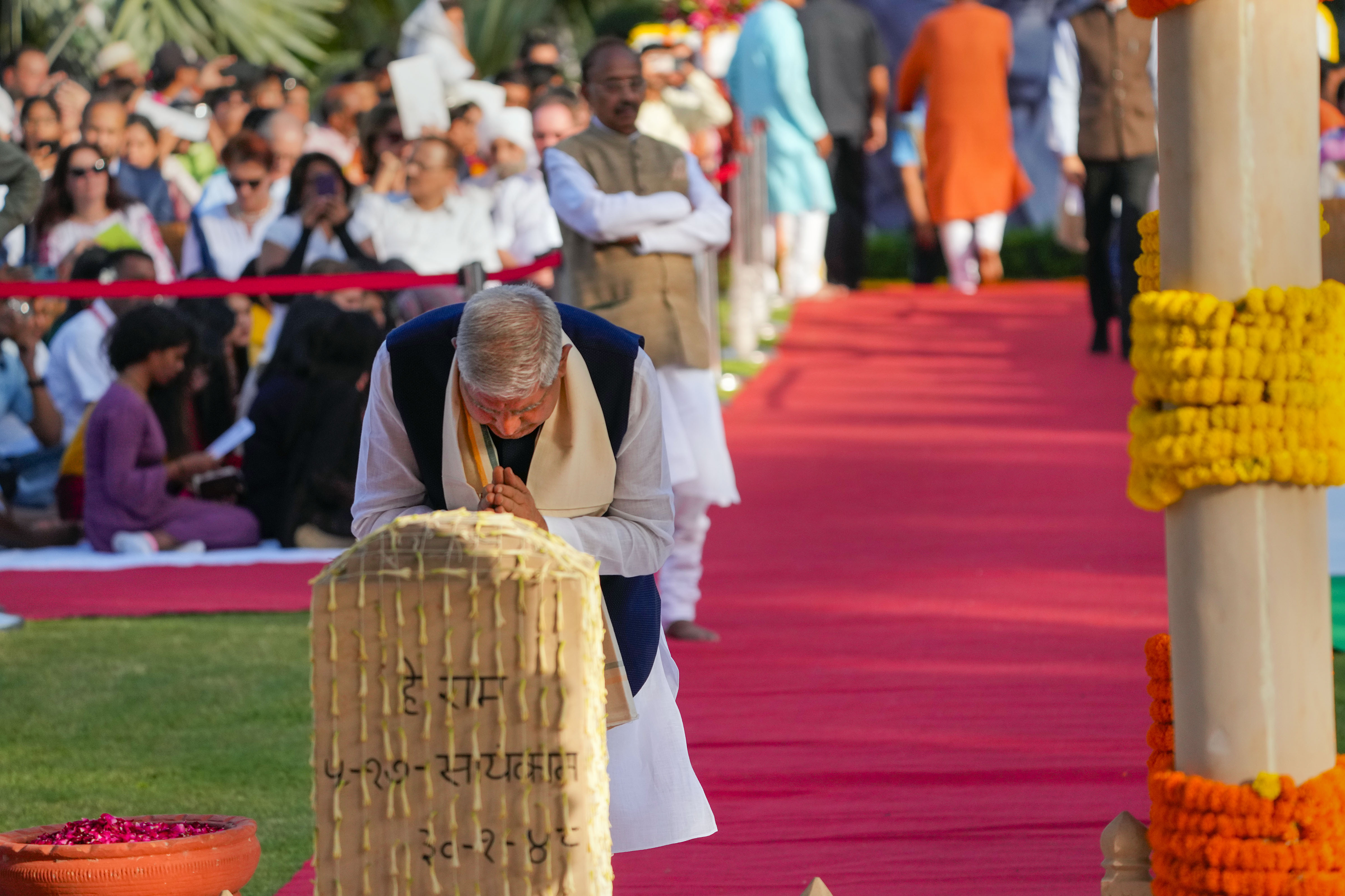 Vice President Jagdeep Dhankhar pays tribute to Mahatma Gandhi at Raj Ghat on Gandhi Jayanti, in New Delhi on Monday. -PTI