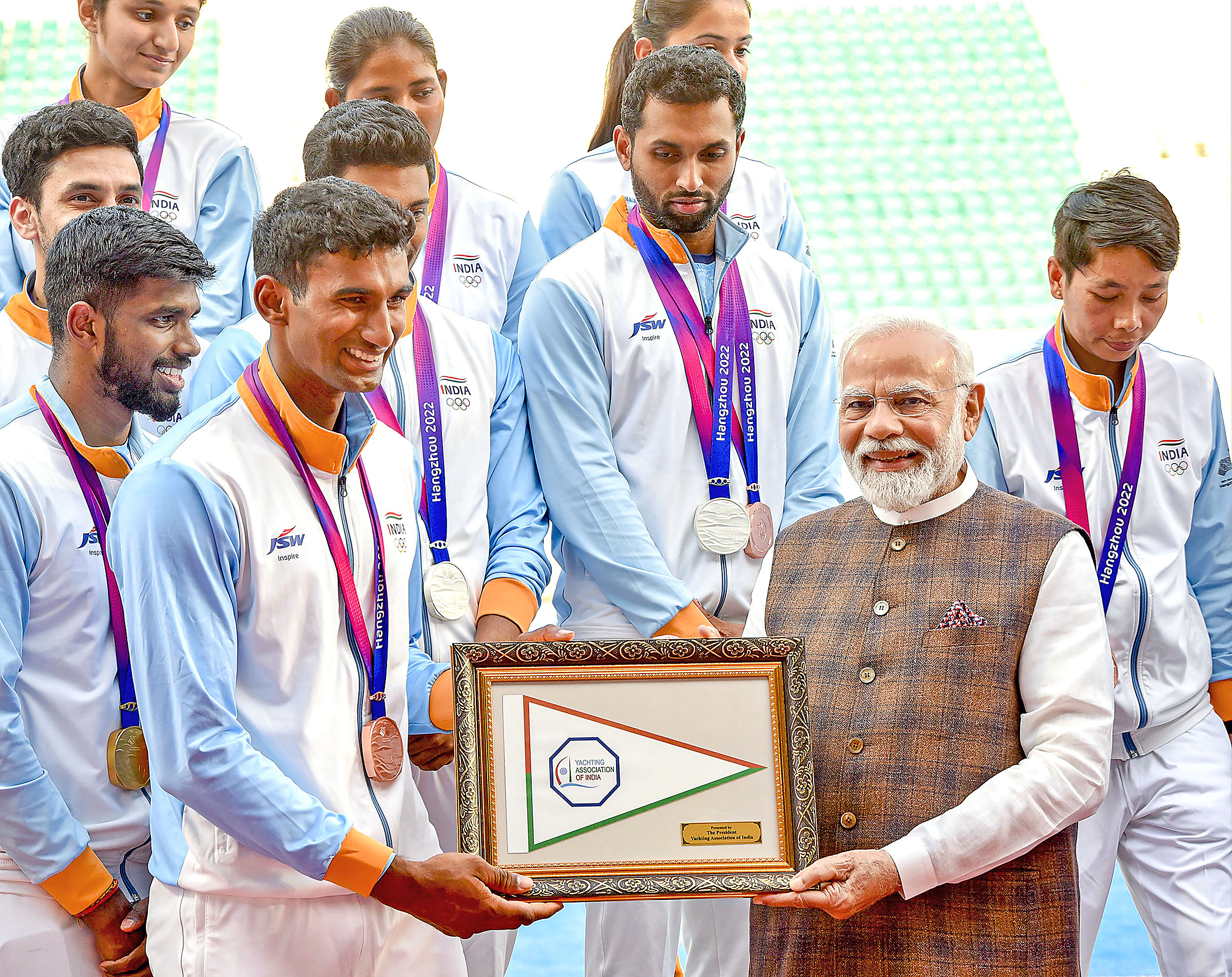 PM Narendra Modi being presented a memento.