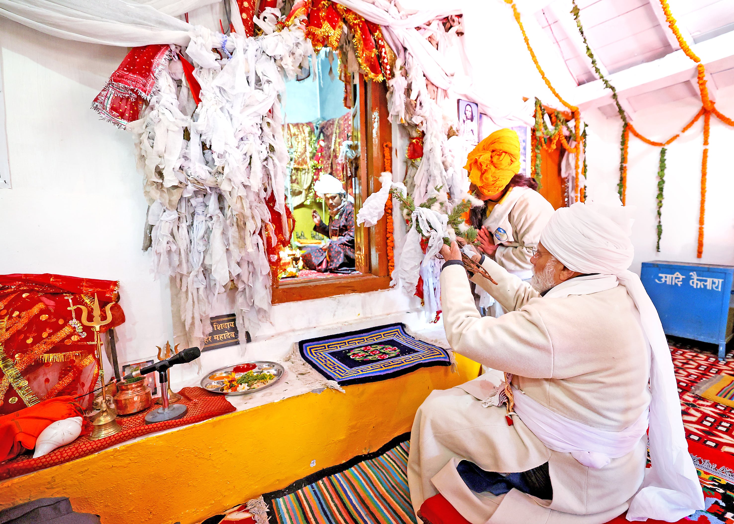 Prime Minister Narendra Modi performs rituals while offering prayers at Parvati Kund in Pithoragarh on Thursday.