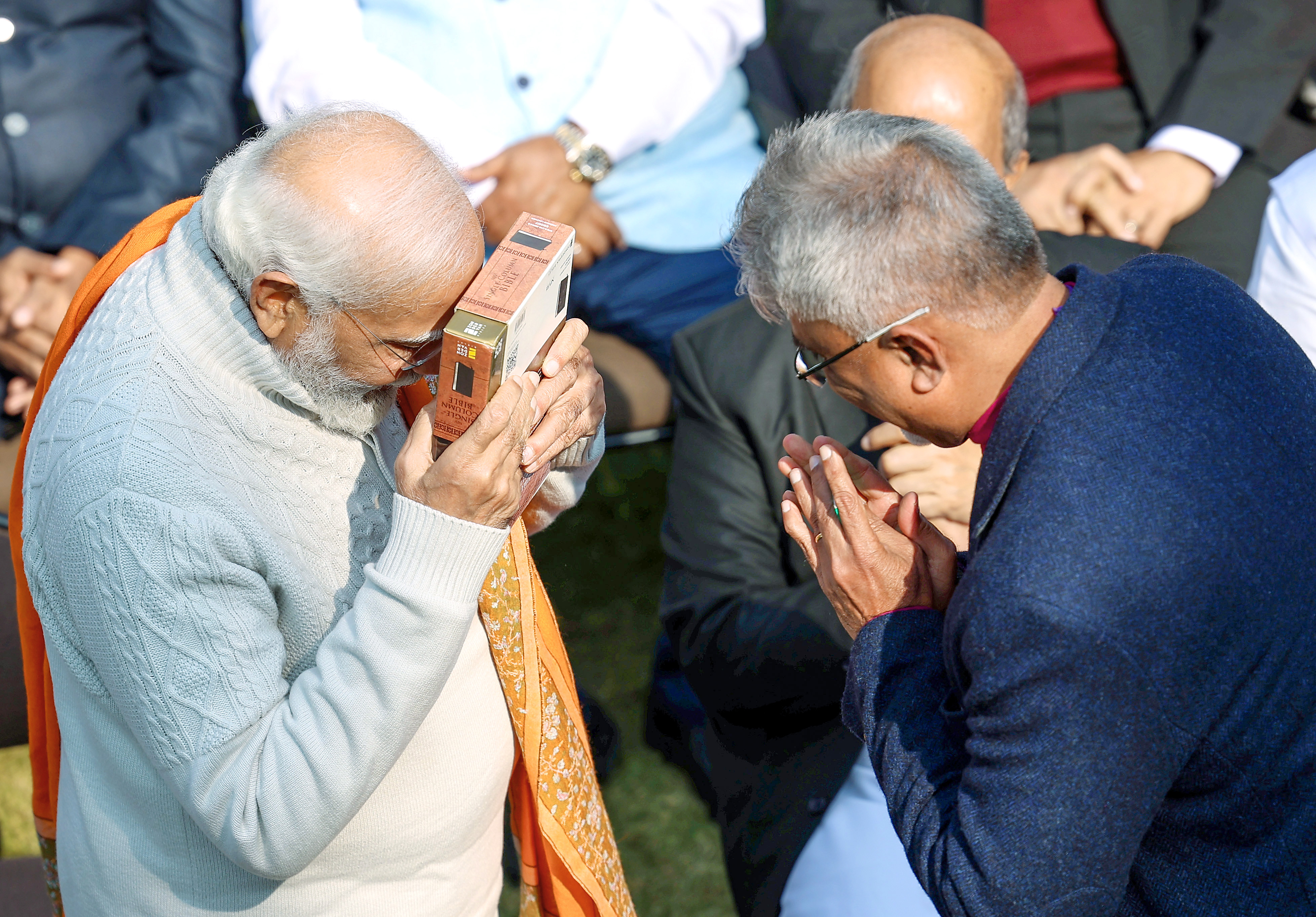 PM Narendra Modi presented with the Holy Bible.