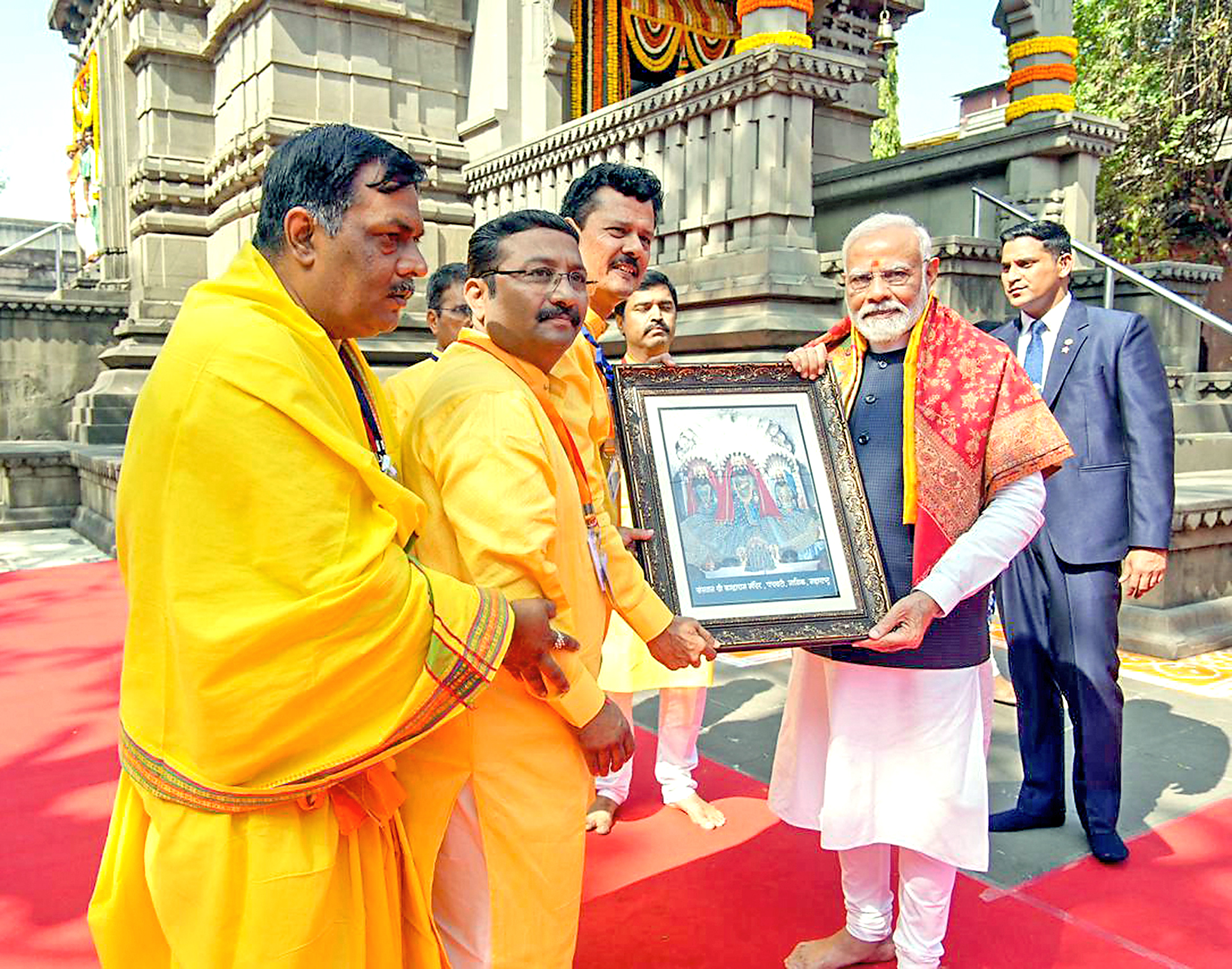 PM Modi being felicitated.