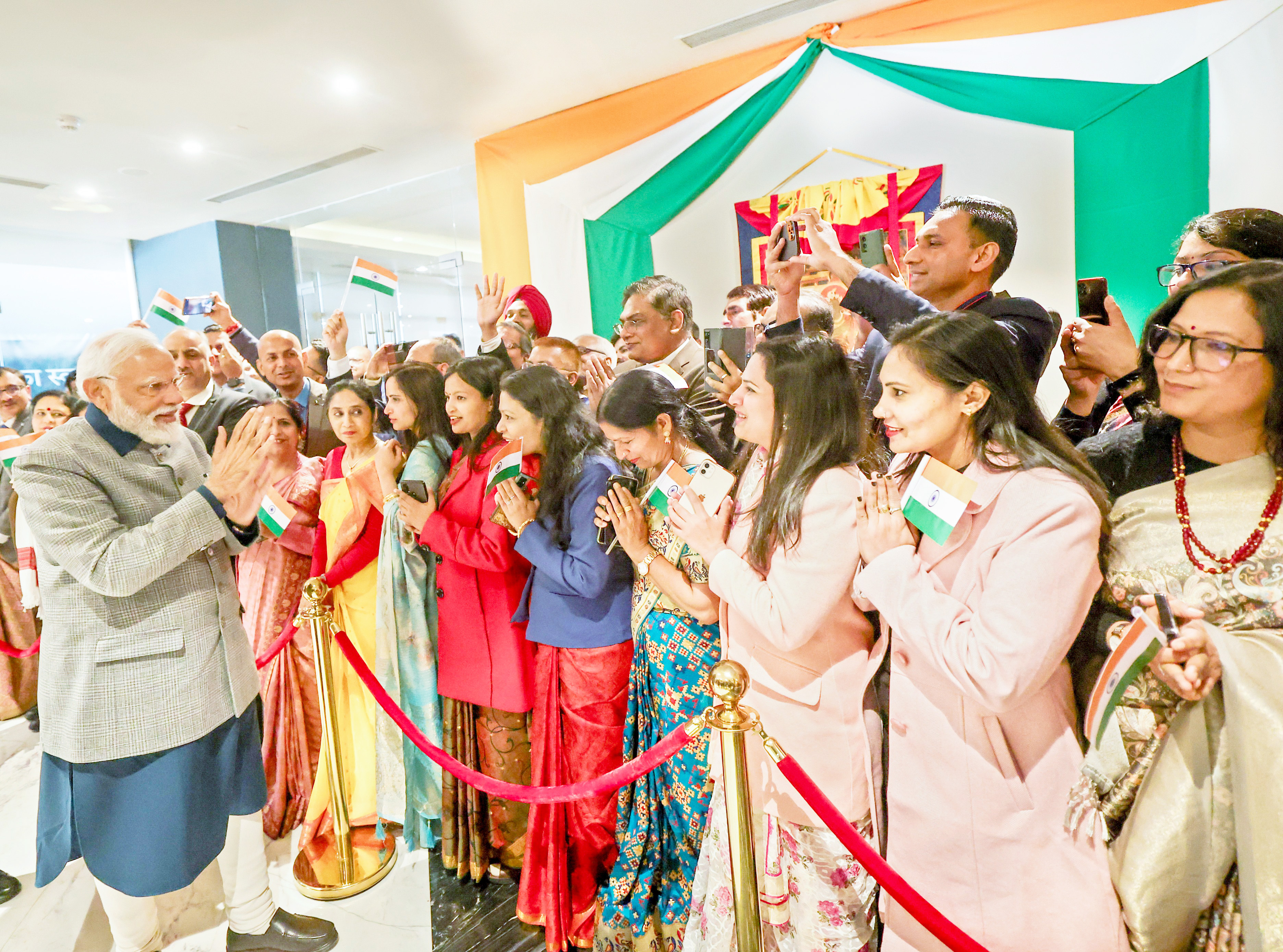 Girl greets as she welcomes Modi.