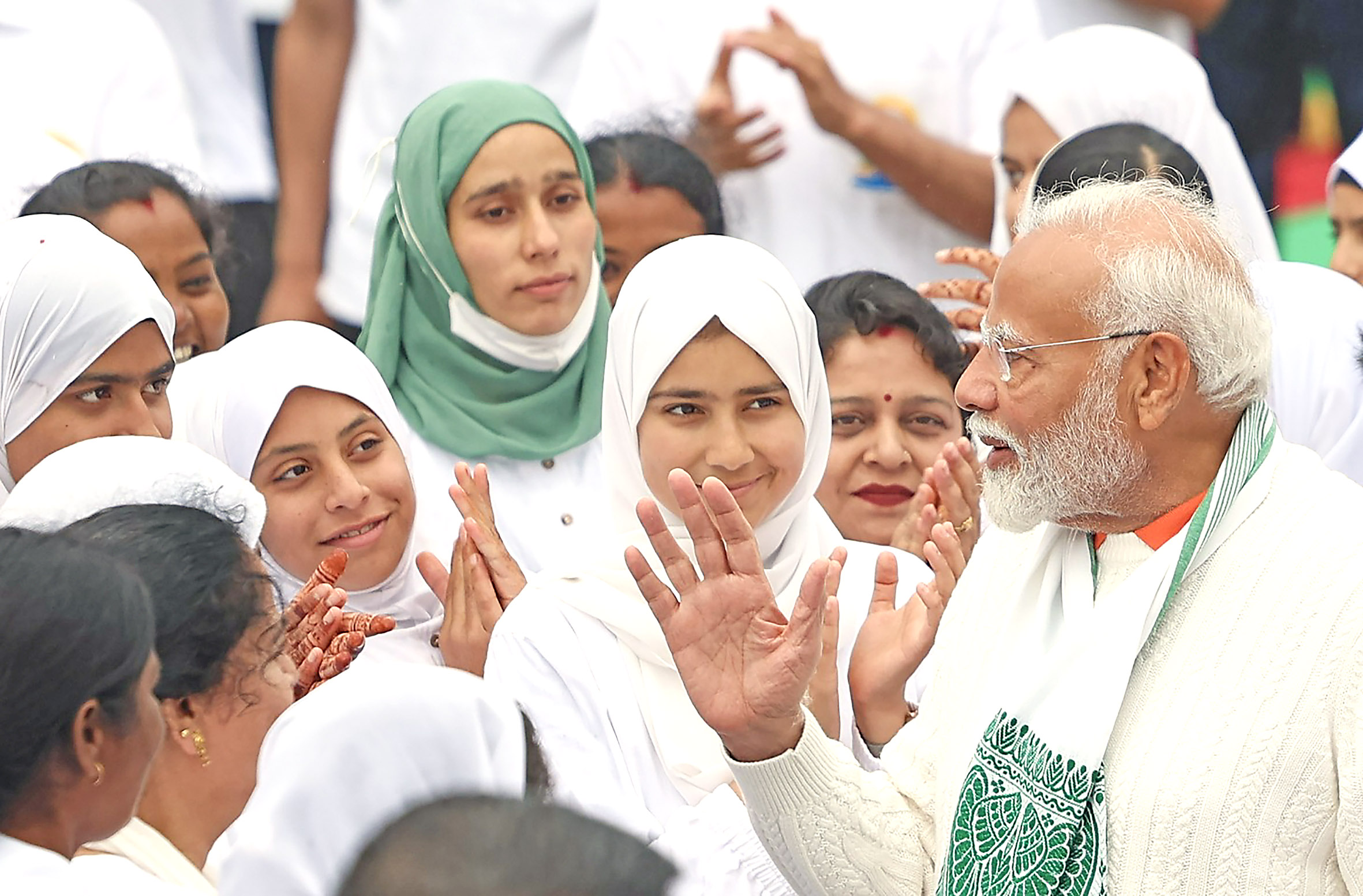 Modi interacts with people after yoga session