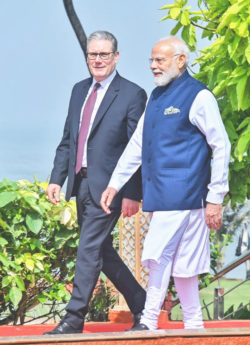 PM Narendra Modi welcomes UK PM Keir Starmer at Raj Bhavan in Mumbai on Thursday.