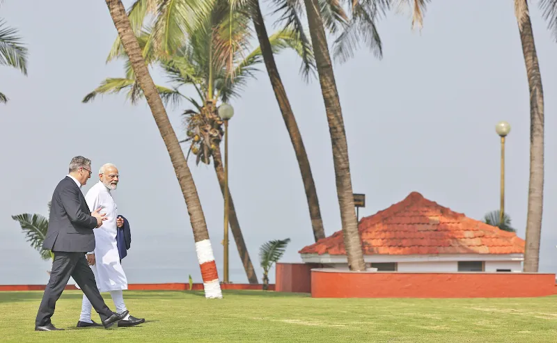 Modi in conversation with Starmer at sea-facing Raj Bhavan in Mumbai.