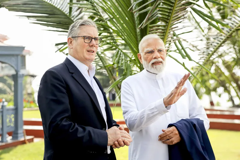 Modi in conversation with Starmer at Mumbai Raj Bhavan.