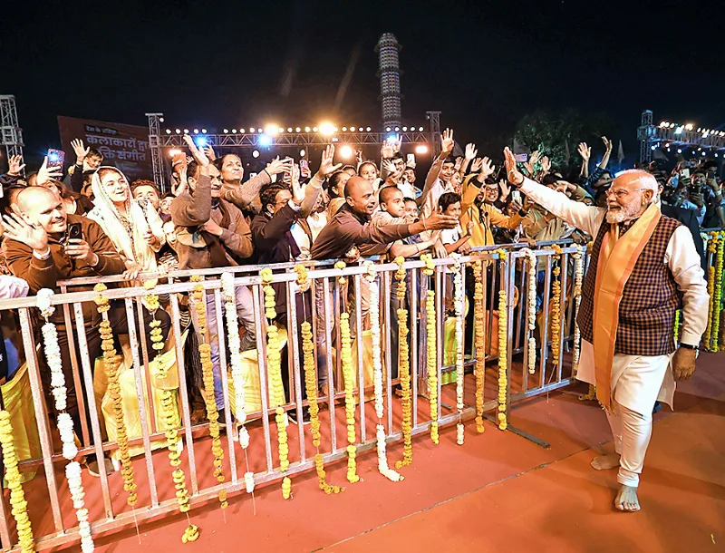 PM Modi waves as he arrives at Somnath Temple.