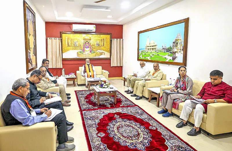 PM Narendra Modi chairs a meeting of the Shree Somnath Trust with Gujarat CM Bhupendra Patel, Deputy CM Harsh Sanghavi and others, in Gir Somnath district, on Saturday.