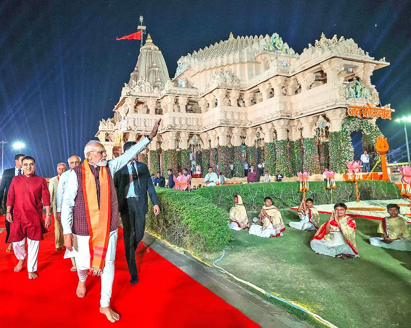 PM Narendra Modi with Bhupendra Patel, Harsh Sanghavi at Somnath Temple.